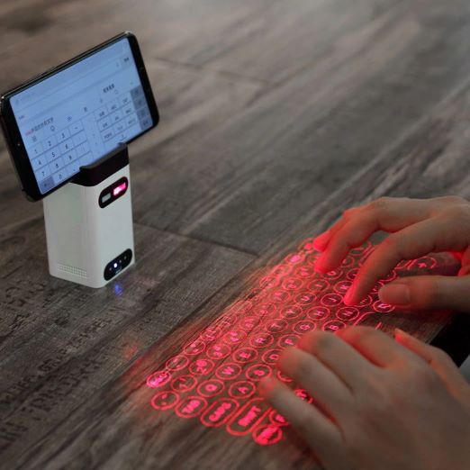 Portable Virtual Laser Keyboard